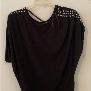 Black top with stones